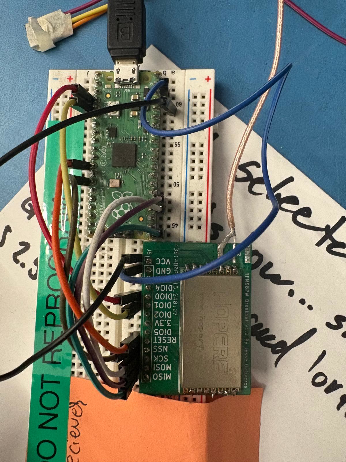 430 MHz radio module wired to a microcontroller