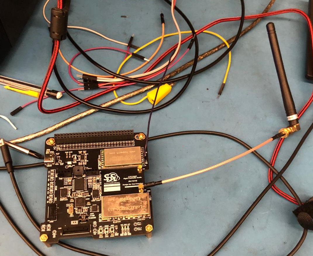 LoRa radio board with antenna connected for RF testing