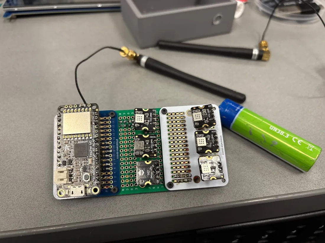 Multi-gas sensor prototype board with a LoRa antenna
